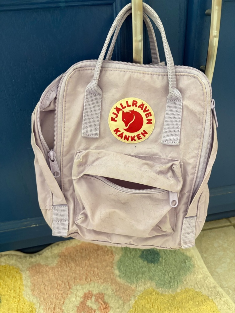 Fjallraven Kånken Mini Backpack in Light Lavender with Orange Logo